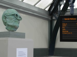A bust of John Grierson by the sculptor Kenny Munro at Stirling Train Station. 